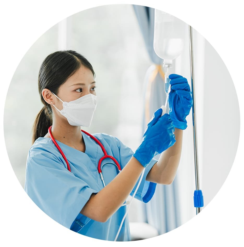 Nurse preparing a Bali Belly Standard IV drip treatment